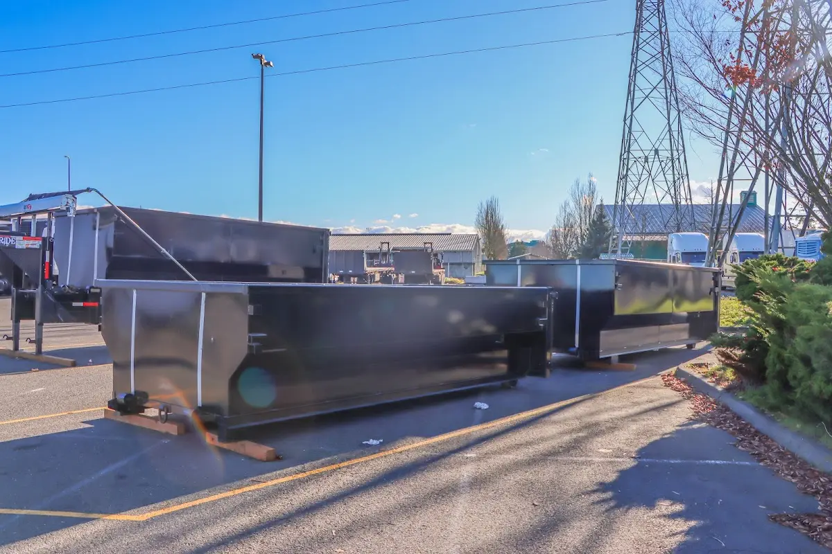 Roll-off dumpster ready for waste disposal at job site for 6 Yard Dumpster Rental in Russellville